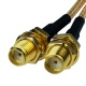 A pair of Cable Assembly SMA F-MMCX R/A MALE