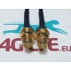 A pair of BNC Male to SMA Female black cable assembly